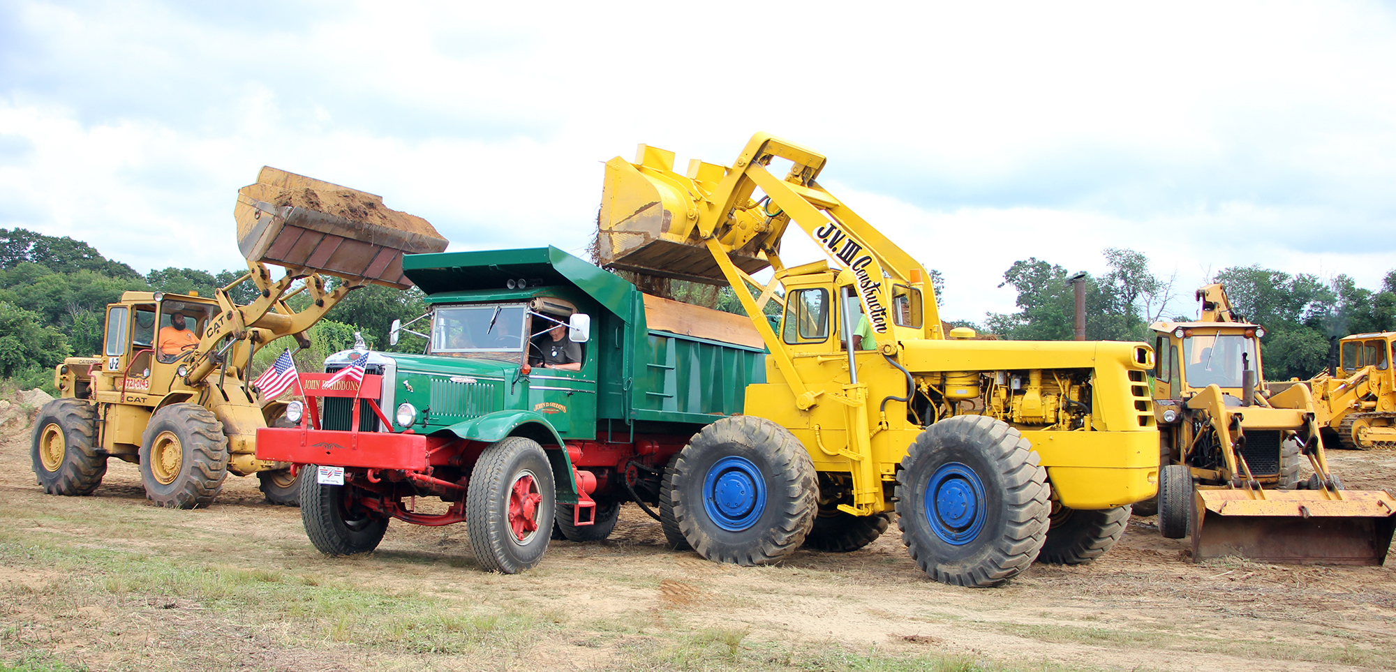 1938 FJ dump truck and two vintage loaders